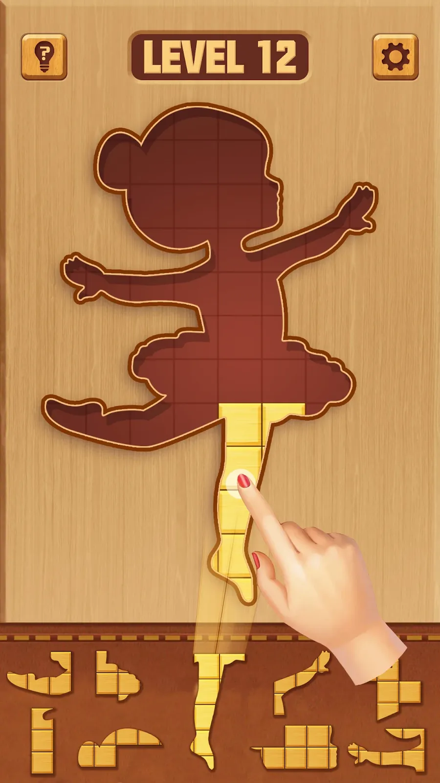 BlockPuz: Block Puzzle Games, a piece being dragged into a figure on level twelve